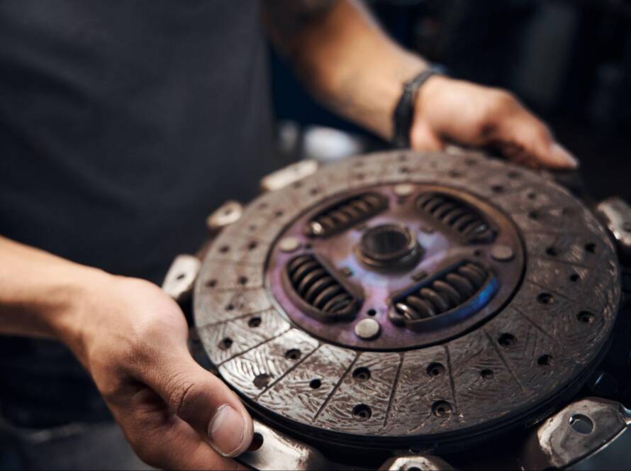 Detailed view of a clutch disc during clutch replacement.