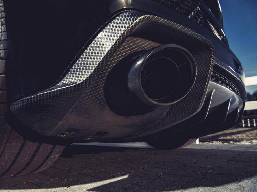 Close-up of a high-performance sports car muffler with custom exhaust system