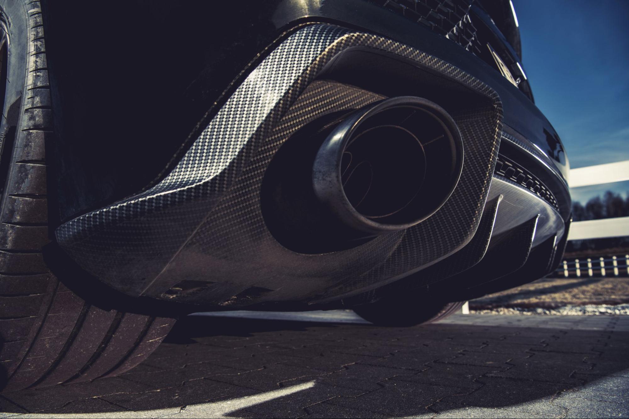 Close-up of a high-performance sports car muffler with custom exhaust system